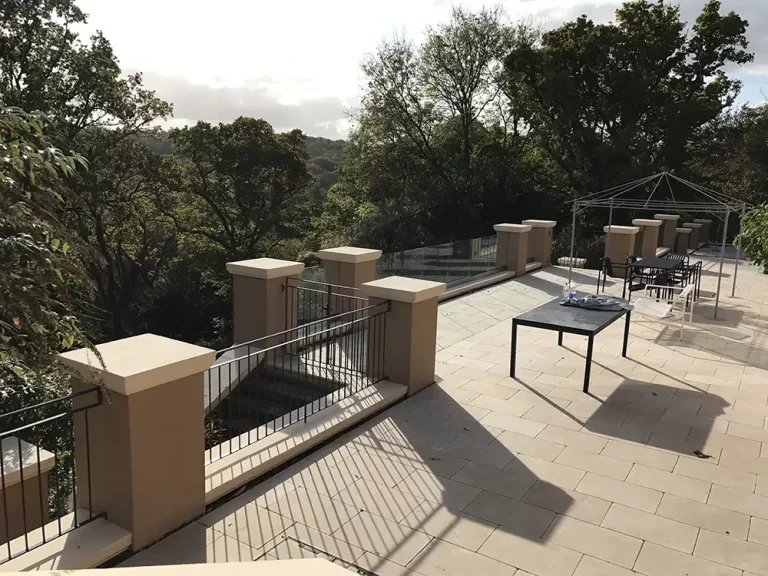 Glass balcony and metal railings